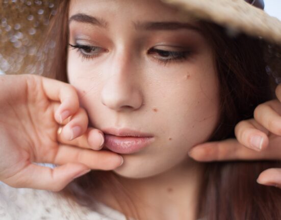 close up young woman hat